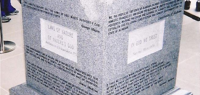 A stone slab with inscriptions on it.