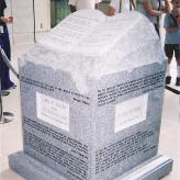 A stone slab with inscriptions on it.