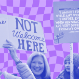A purple checkered background with protestors holding signs in favor of women's rights